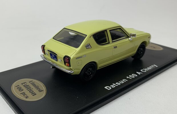 Golden Oldies 1:43 Datsun 100 A Cherry geel resin model - Limited 100 pcs
