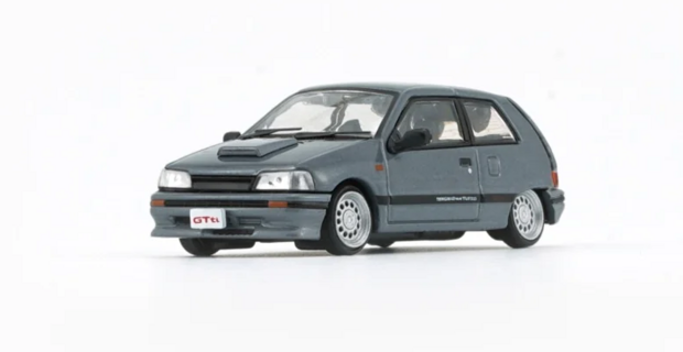 BM Creations 1:64 Daihatsu Charade 1991, 2 deurs GTti grijs