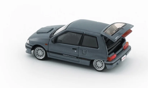 BM Creations 1:64 Daihatsu Charade 1991, 2 deurs GTti grijs