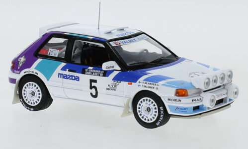 IXO 1:43 Mazda 323 GT-X No 5 T. Salonen V. Silander TeamMazda Euroea 1000 Lakes Rallye met nachtlicht