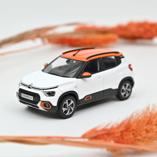 Norev 1:43 Citroen C3 (Indian market) 2021 wit met oranje