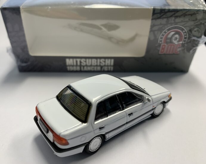 BM Creations 1:64 Mitsubishi Lancer GTI, white 1988 left hand drive