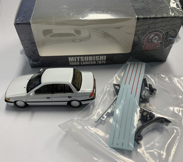 BM Creations 1:64 Mitsubishi Lancer GTI, white 1988 left hand drive