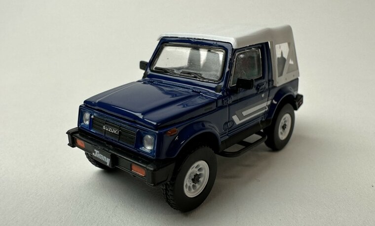 BM Creations 1:64 Suzuki Jimny SJ413 blauw  wit LHD