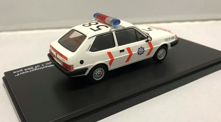 Triple9 Collection 1:43 Volvo 343 1400 &quot;Politie Wieringerwerf&quot; 1982 wit with original long bumpers.