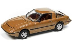 Johnny Lightning 1:64 Mazda RX7 1981 Maya goud metallic