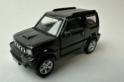 BM Creations 1:64 Suzuki Jimny JB43 LHD, dark grey 1998